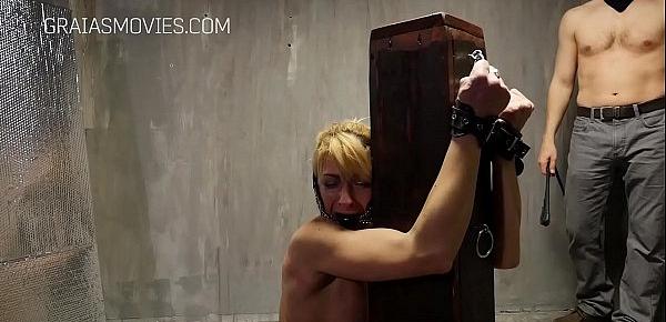  Blonde bitch tied to a pole and whipped